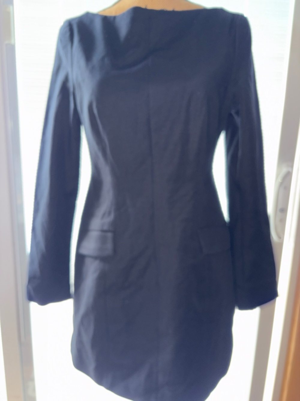 Long-Sleeve Black Dress with Pocket Flap Detail and Zippered Back